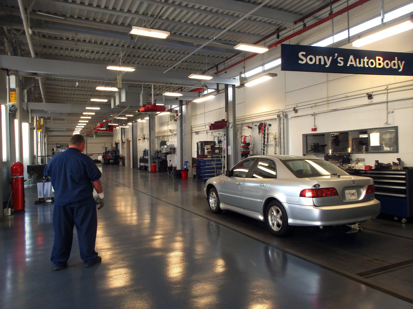 Roy's Auto Repair team master mechanics at work in the San Fernando Valley shop